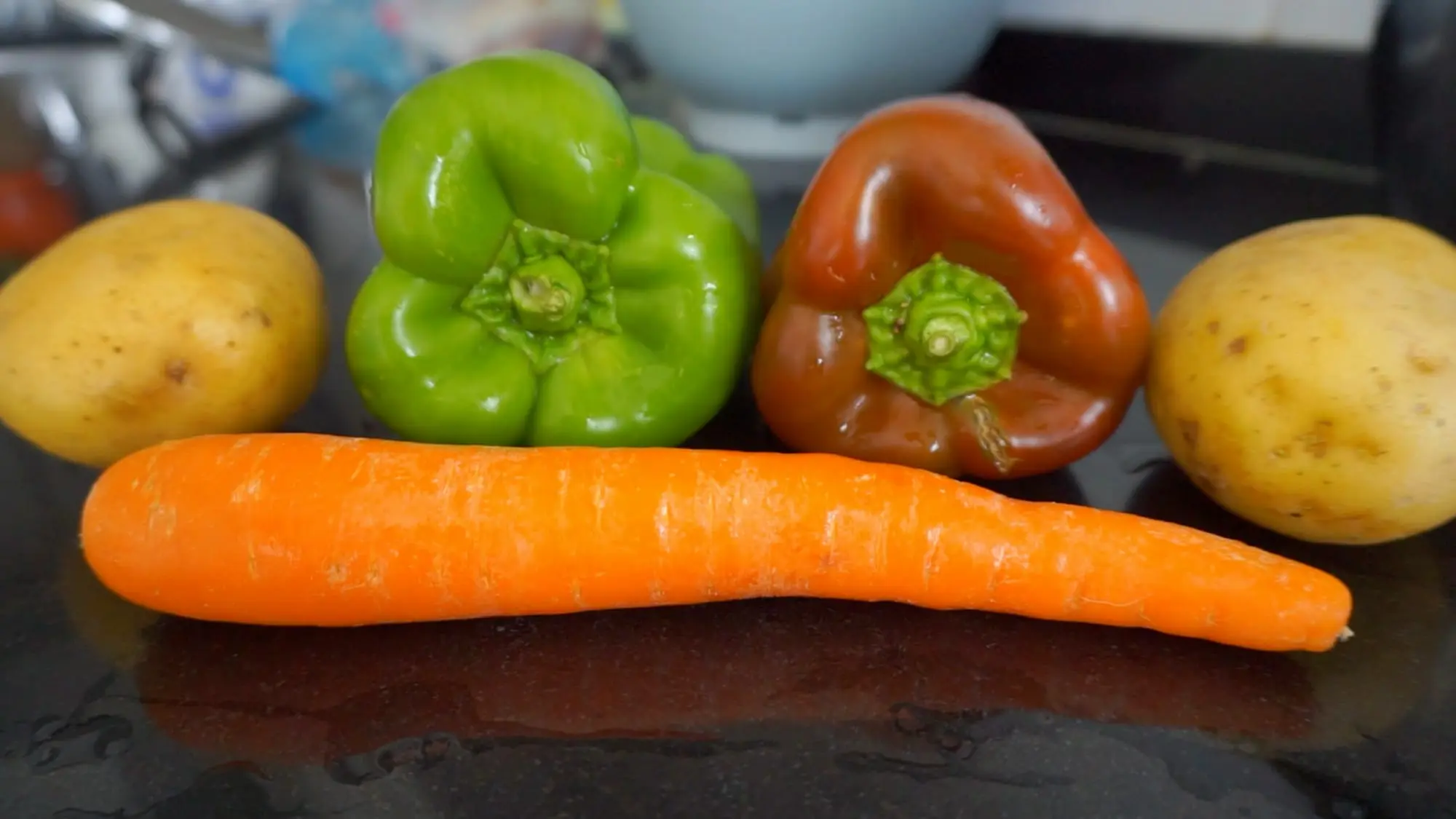 Potatoes, carrots, and green and red bell peppers for menudo