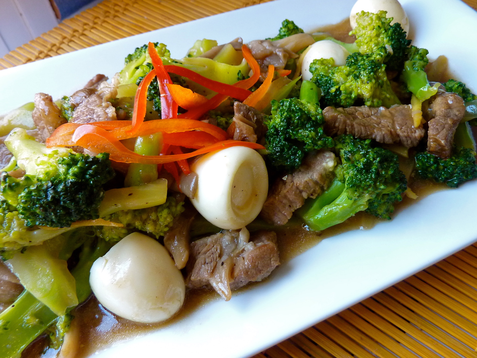 Beef, mushroom, and broccoli stir fry on a plate