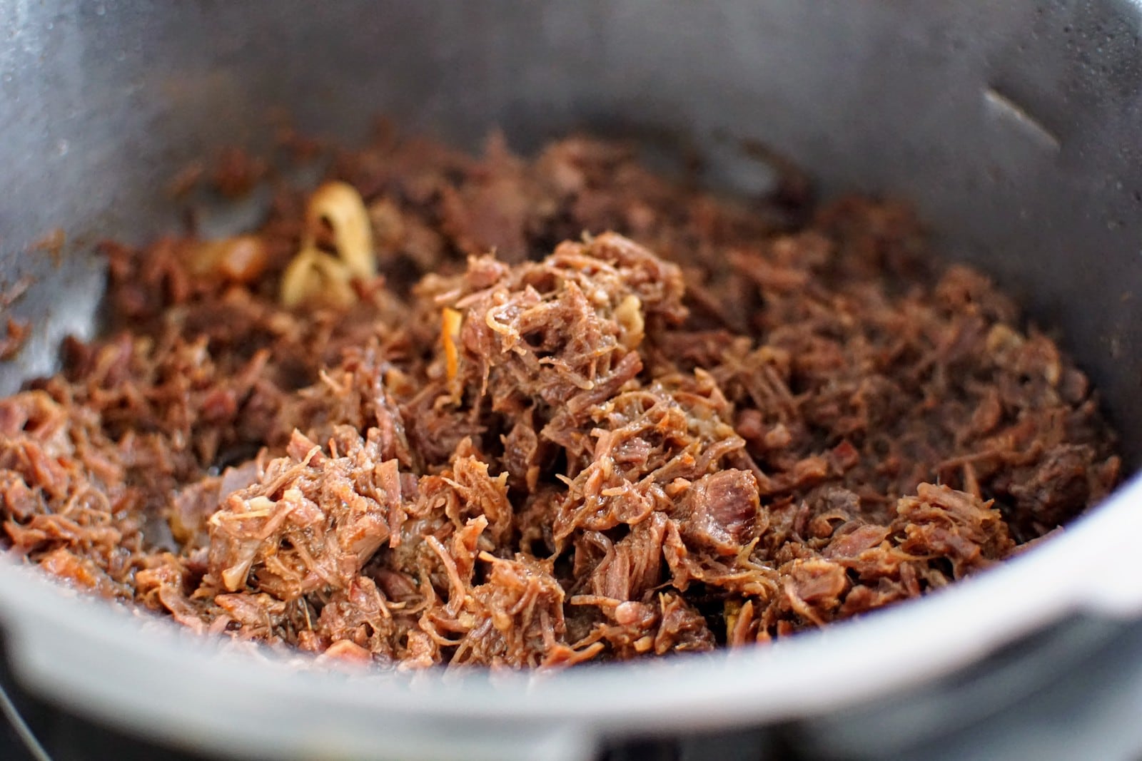 Corned beef recently cooked in a pressure cooker pot