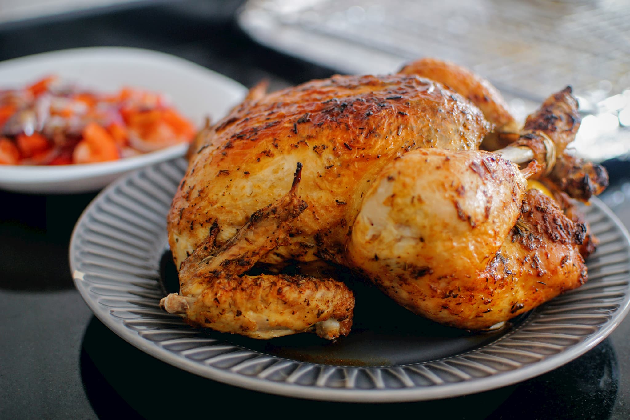 Slow-cooked chicken roast served on a plate