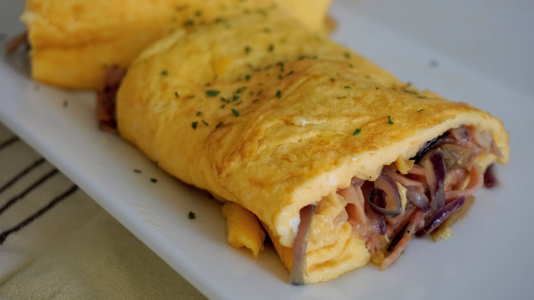 Tortilla de bacon champiñón y cebolla muestra representativa