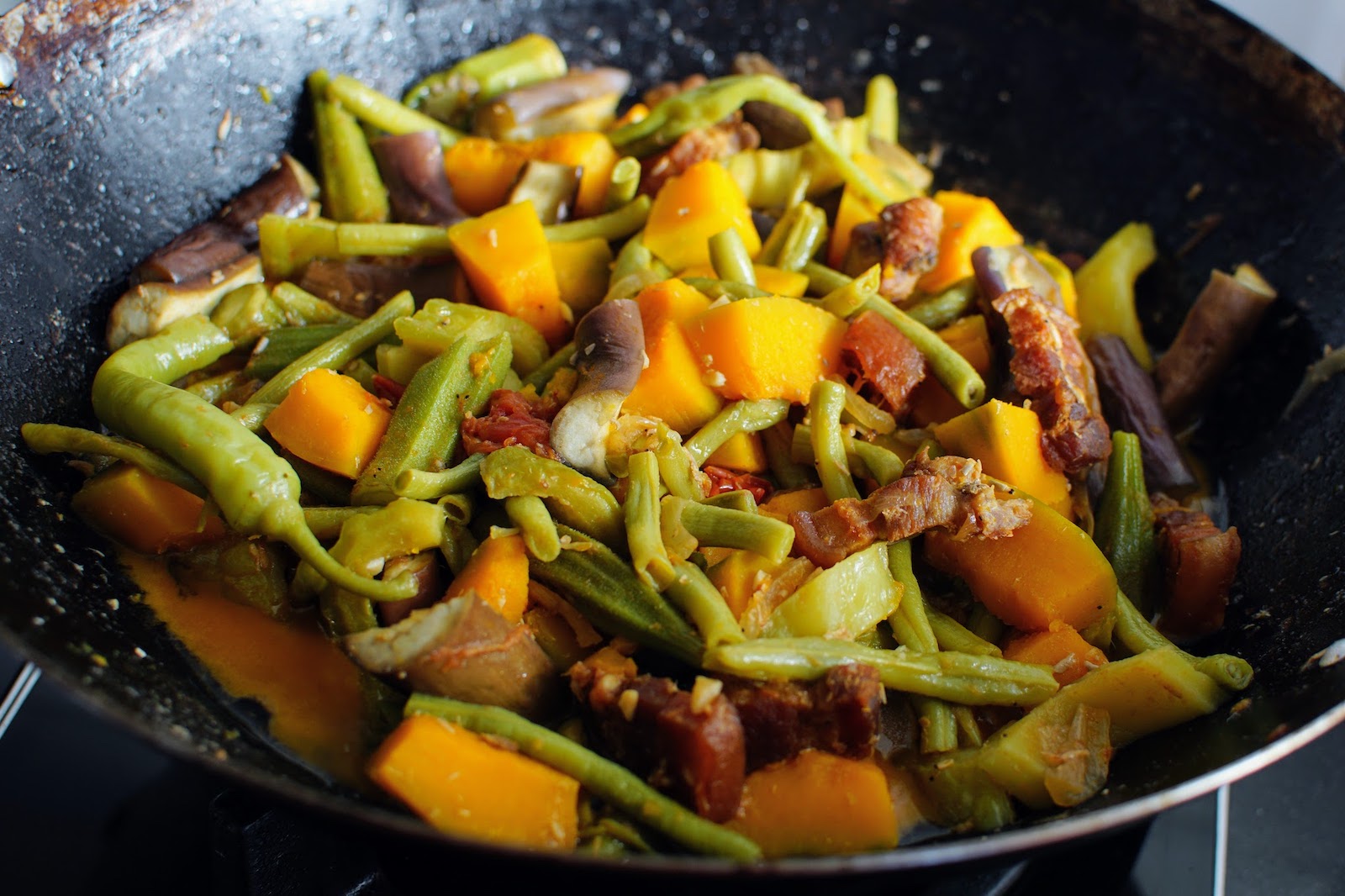 Cooking Pinakbet in a wok