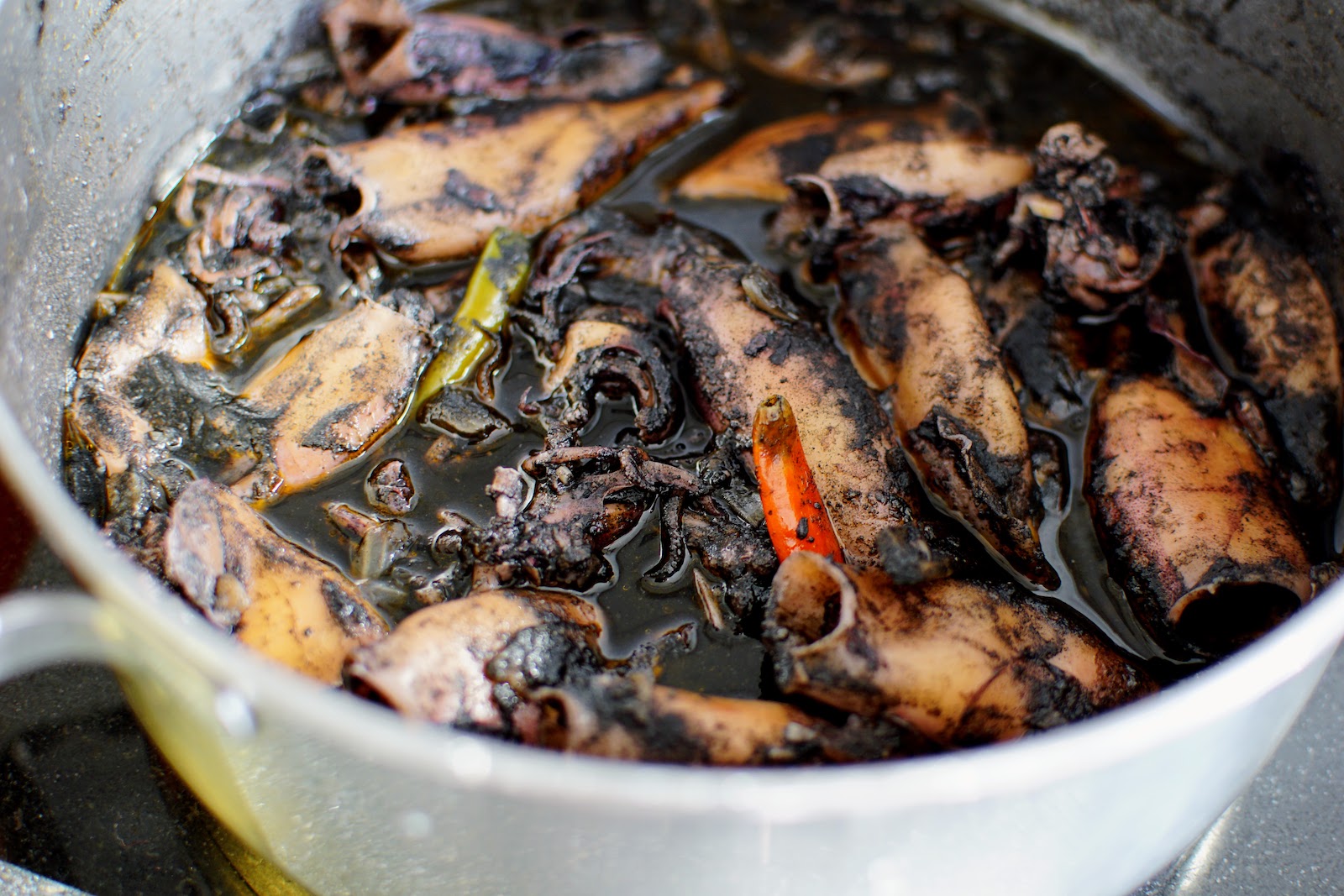 Squid adobo in a pot